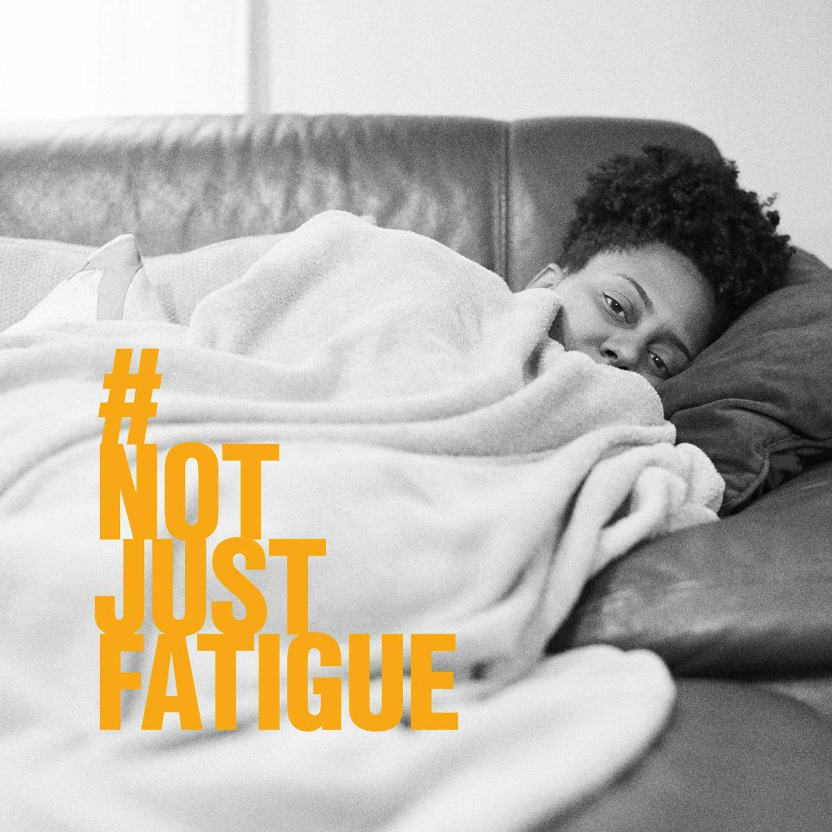Photo of woman lying on her couch with #notjustfatigue.
