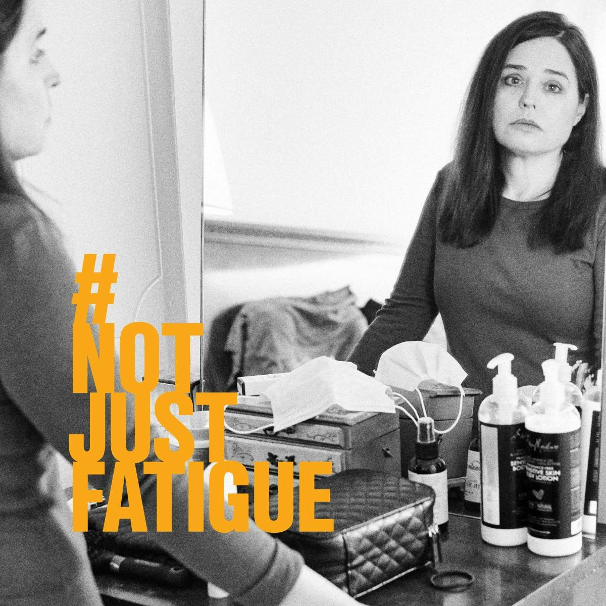 #NotJustFatigue photo of a woman standing in front of mirror